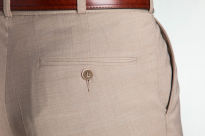 Spodnie męskie beżowe z tkaniny o splocie tropik. Spodnie wykonane w szwalni Szczygieł